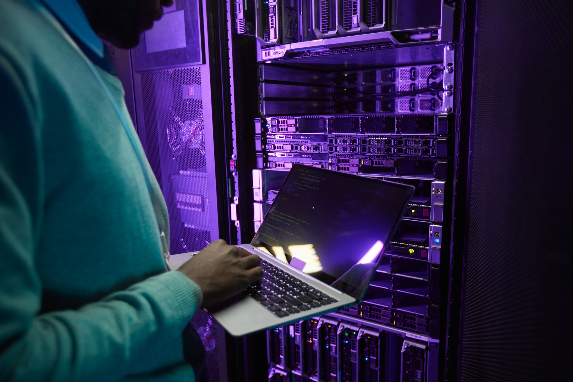 IT Engineer Using laptop in Data Center